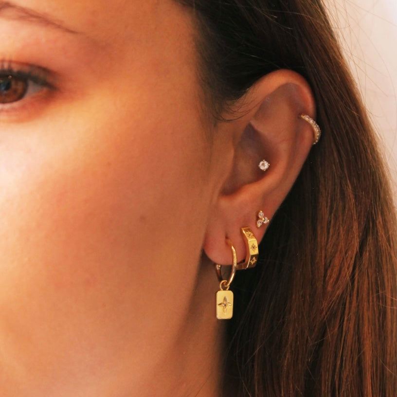 Octagonal Huggies - White Topaz in
18KT Yellow Gold Plate